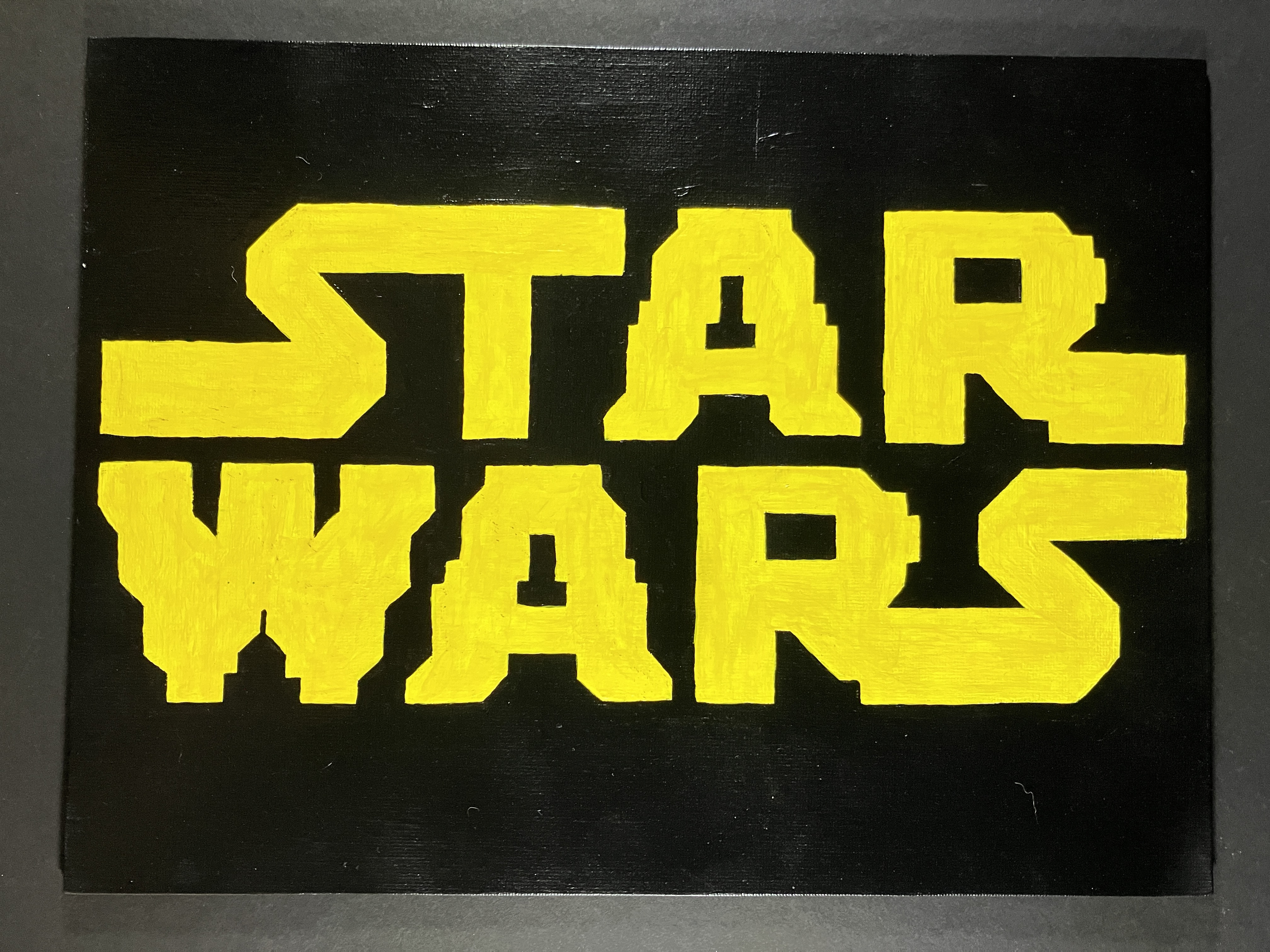 Acrylic PaintingStar Wars logo in yellow on black background in 8-bit style, 9 in by 12 in